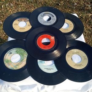 45s Lot of 7 including And Griffith